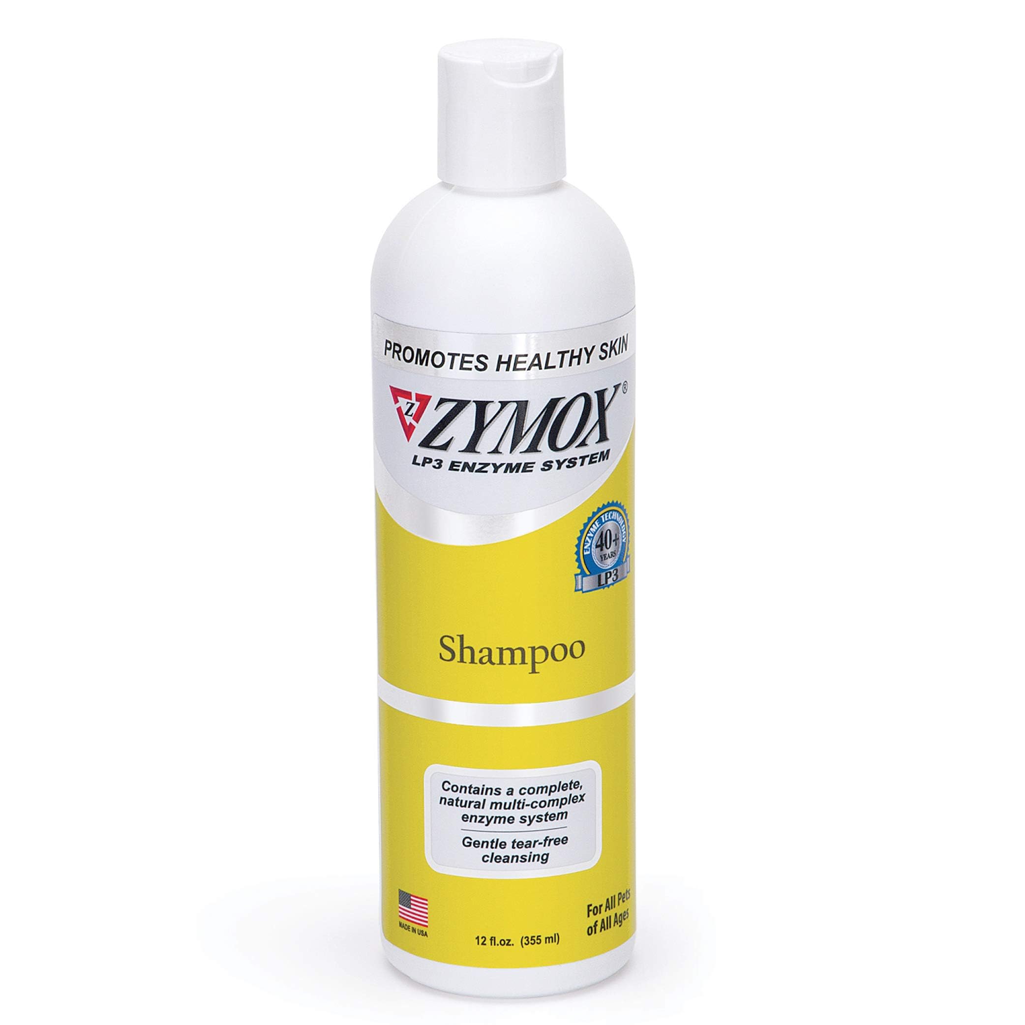 Zymox enzymatic shampoo bottle 12oz shows tear-free formula for pets' sensitive skin.
